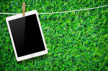 Hanging blank digital tablet.