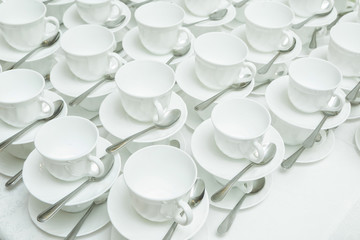 Abstract blurred of many rows coffee or tea cups