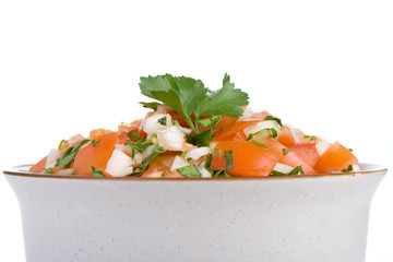 Fresh Salsa – A bowl of fresh salsa. White background.