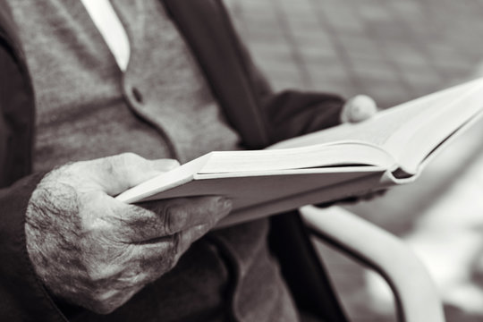 Old Man Reading A Book, In Black And White