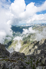 rocky mountain landscape covered with clouds