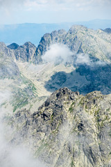 rocky mountain landscape covered with clouds