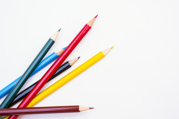 colored pencils on white background