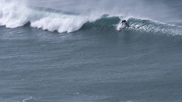surfers in the ocean on the atlantic coast