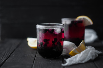 Soda with blueberries and lemon