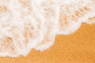 Sand  on the beach with sea wave top view