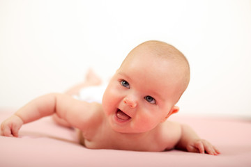 Portrait of adorable baby.Baby lying on his stomach
