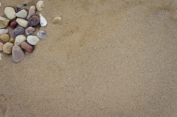 Fototapeta na wymiar Beautiful sand background with stones