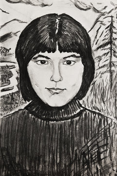 Charcoal drawing on paper. Portrait of a beautiful girl