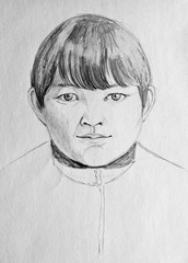 Pencil drawing on paper. Portrait of a boy