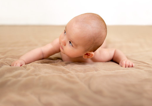 Portrait of adorable baby.Baby lying on his stomach