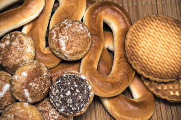 Honey-cake, bagels and cookies, close up background