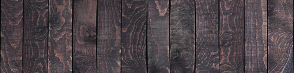 Dark wooden board  in the panorama