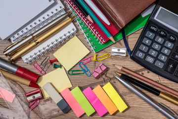 School supplies on wooden desk