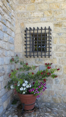 Fototapeta na wymiar Barred window at Santa Catalina Castle