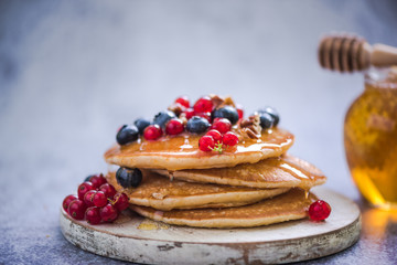 pancakes with redcurrant and berries