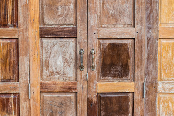 Locked wooden door.