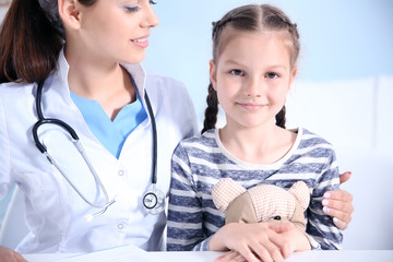 Cute girl visiting a doctor