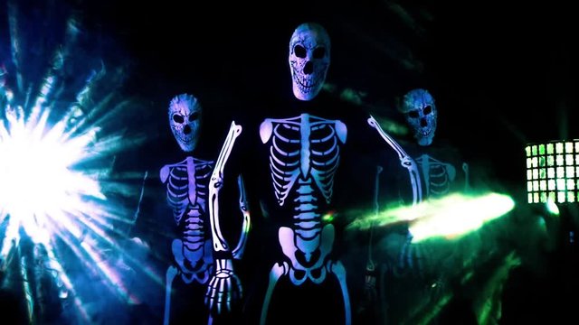three funky disco skeleton Halloween cool dance