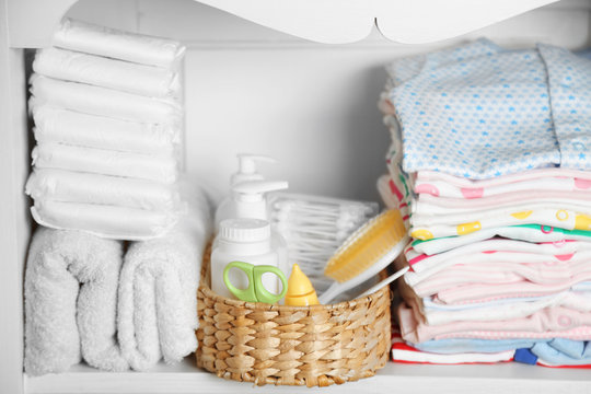 Set of baby hygiene accessories on shelf