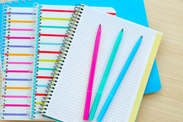 School notebooks and supplies, closeup