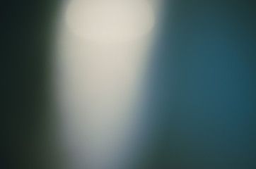 Blurred light and lamp on dark background
