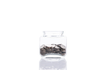 saving money concept,money coin stack growing tree on piggy bank. isolated on white background.