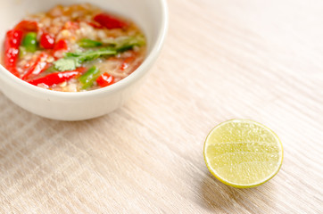 Thai spicy seafood dipping sauce on wooden background