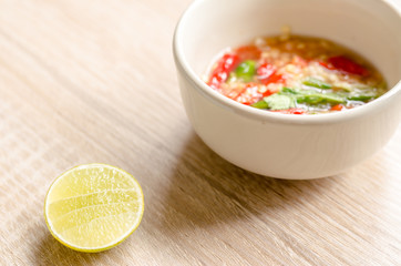 Thai spicy seafood dipping sauce on wooden background