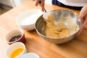 Mixing dough in bowl by hand