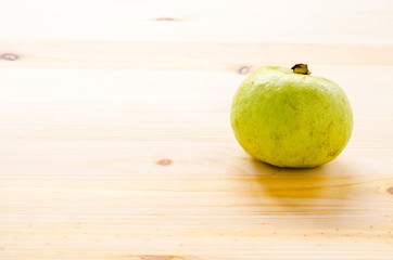 The tropical fruit high vitamin c, fresh guavas on wood backgrou