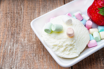 Ice cream sundae, strawberry and candies