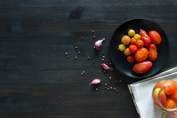 tasty canned tomatoes on a plate