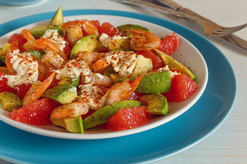 Salad - a mix of avocado, shrimp and grapefruit.