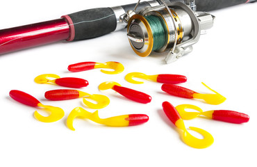 White background isolated fishing bait tackle gear Wobbler red yellow spinner reel rod spinning