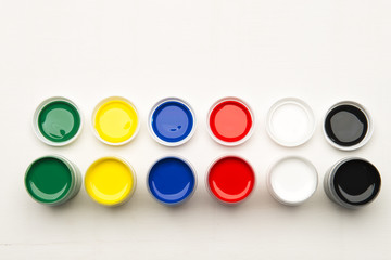 Set of paint and supplies on a white background