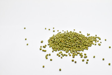 Pile of Mung beans seeds isolated on white background