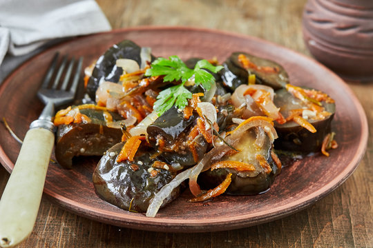 Marinated eggplant with onion and carrot. horizontal