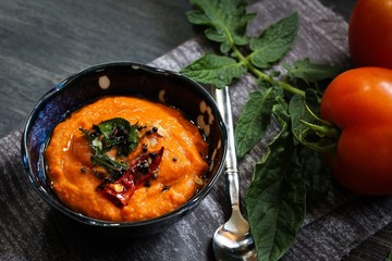 Tomato Chutney / Spicy Tomato dip on dark moody background