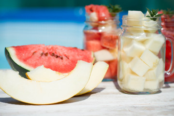 Melon juice in the glass on the wooden table