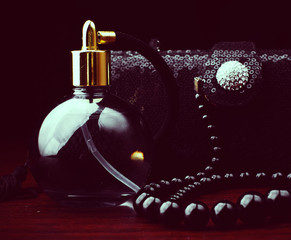 Black clutch and perfume