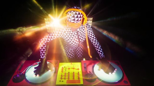 sexy DJ mixes in UV fluorescent costume