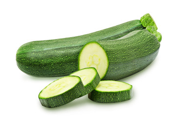 Isolated fresh whole and cutted zucchini on a white background.  Design element for product label, catalog print, web use.