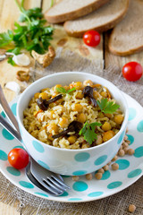 Vegetarian vegetable pilaf with chickpeas and wild mushrooms on