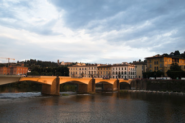 Obraz premium Bridge over the Arno river is one of the most famous tourist attractions in Florence, Italy 