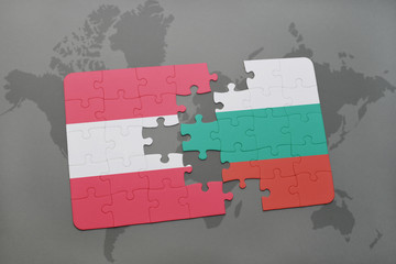 puzzle with the national flag of austria and bulgaria on a world map background.