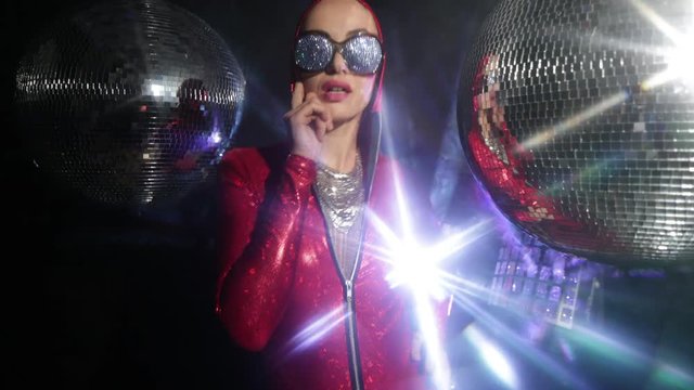 sexy cool disco woman posing and dancing