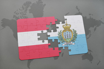 puzzle with the national flag of austria and san marino on a world map background.