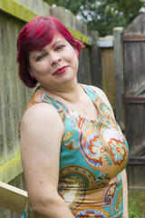 Fototapeta premium Portrait of woman in dress outdoors