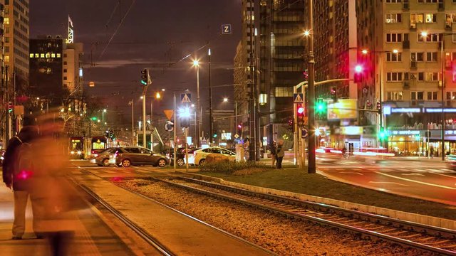 City life in center of Warsaw. People going back home in the evening.